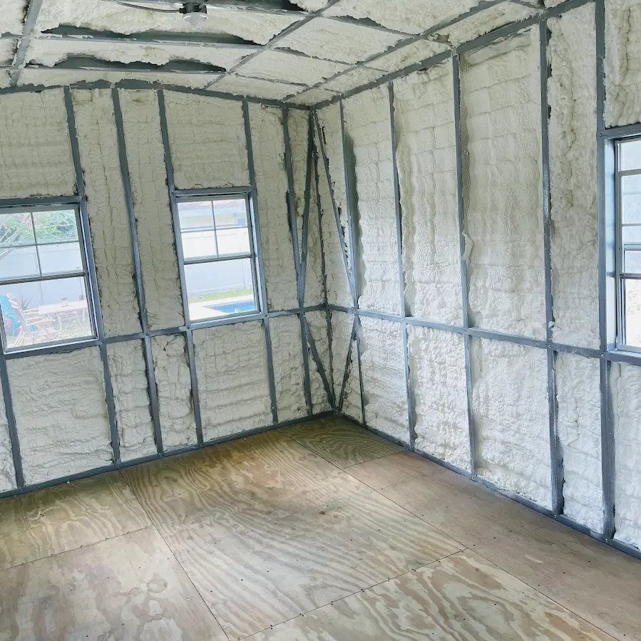 Closed-cell spray foam insulation applied to wall cavities in a residential project in Raytown